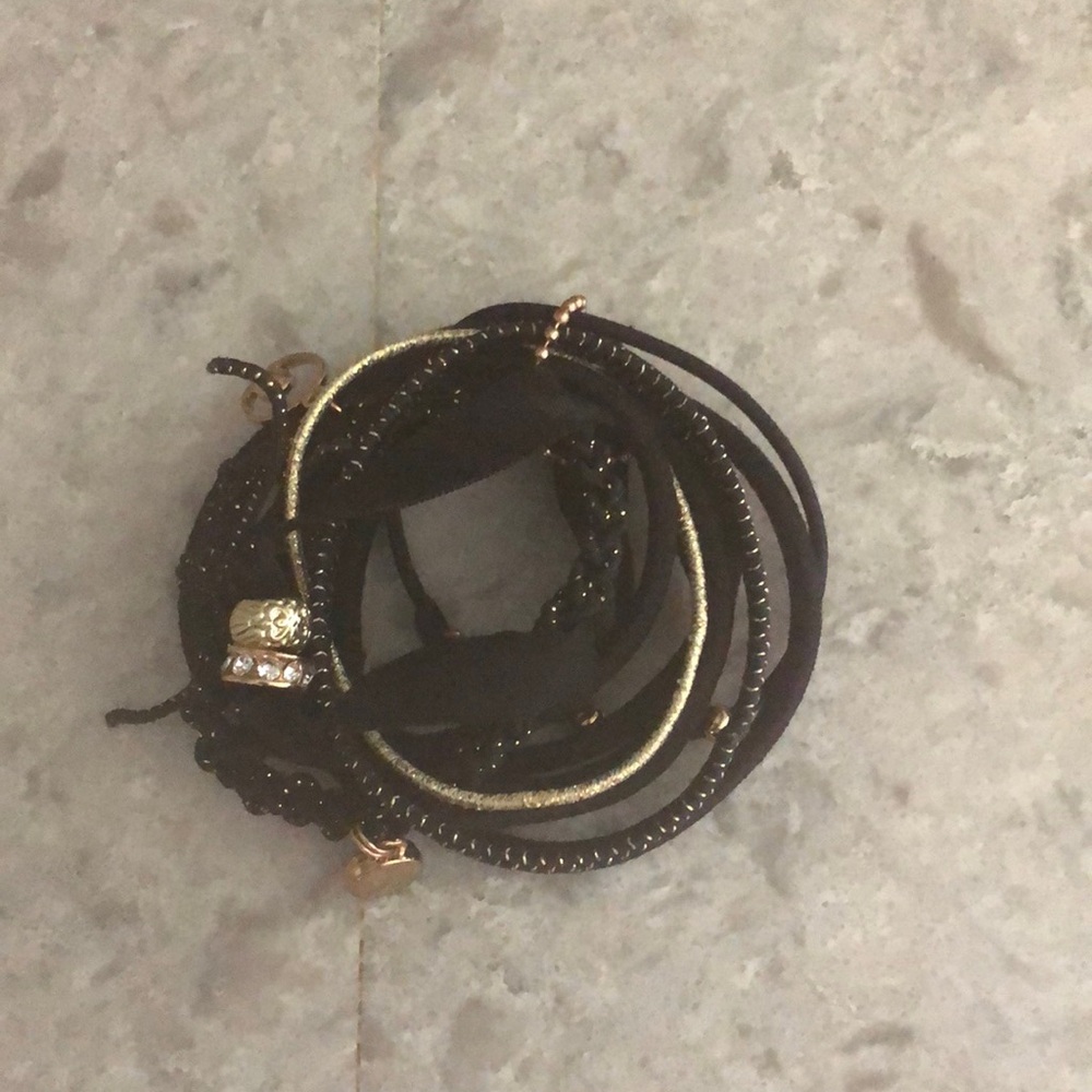 Cute multi bracelet black & gold with charms